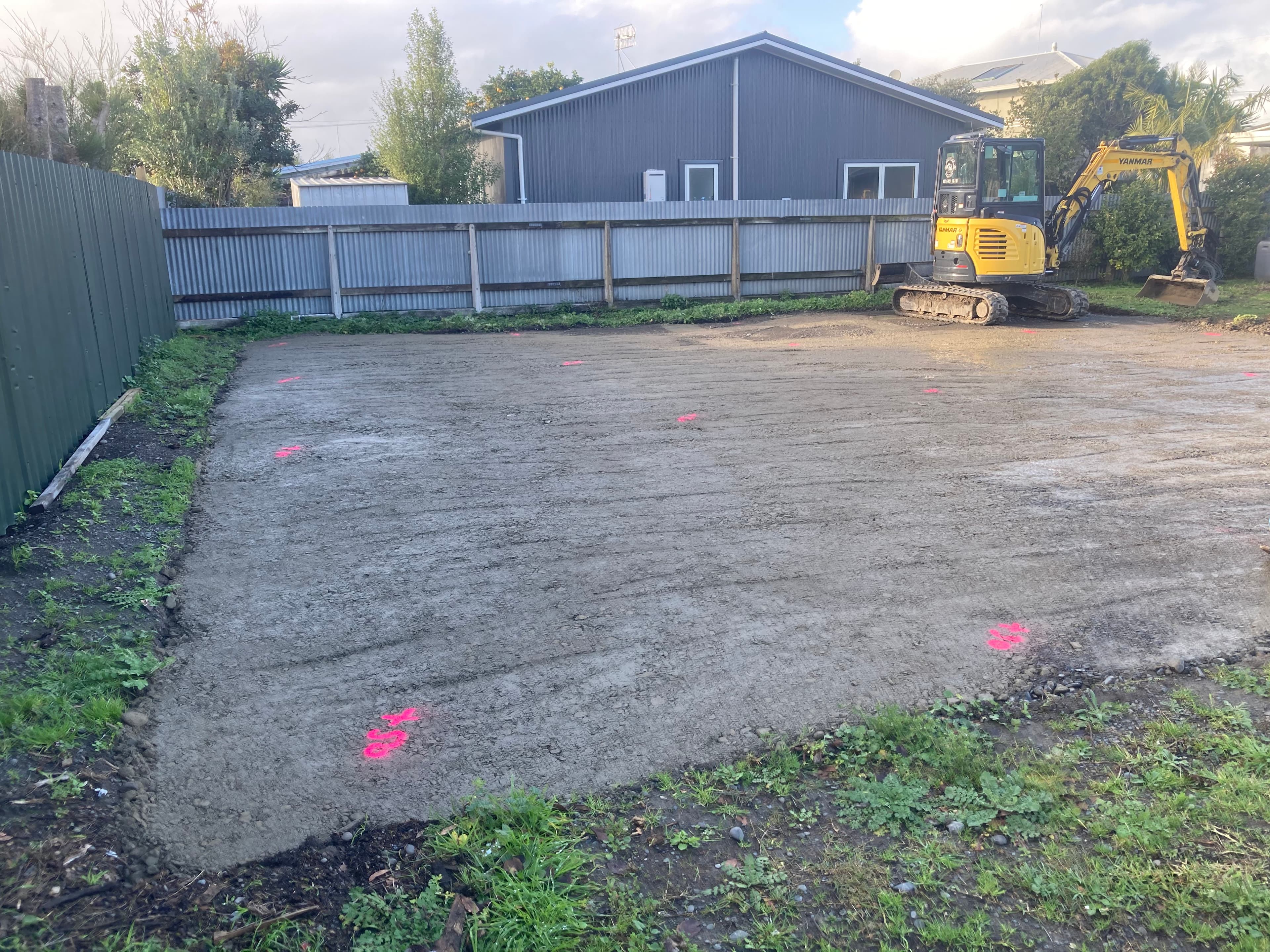 Foundation excavation with survey markers