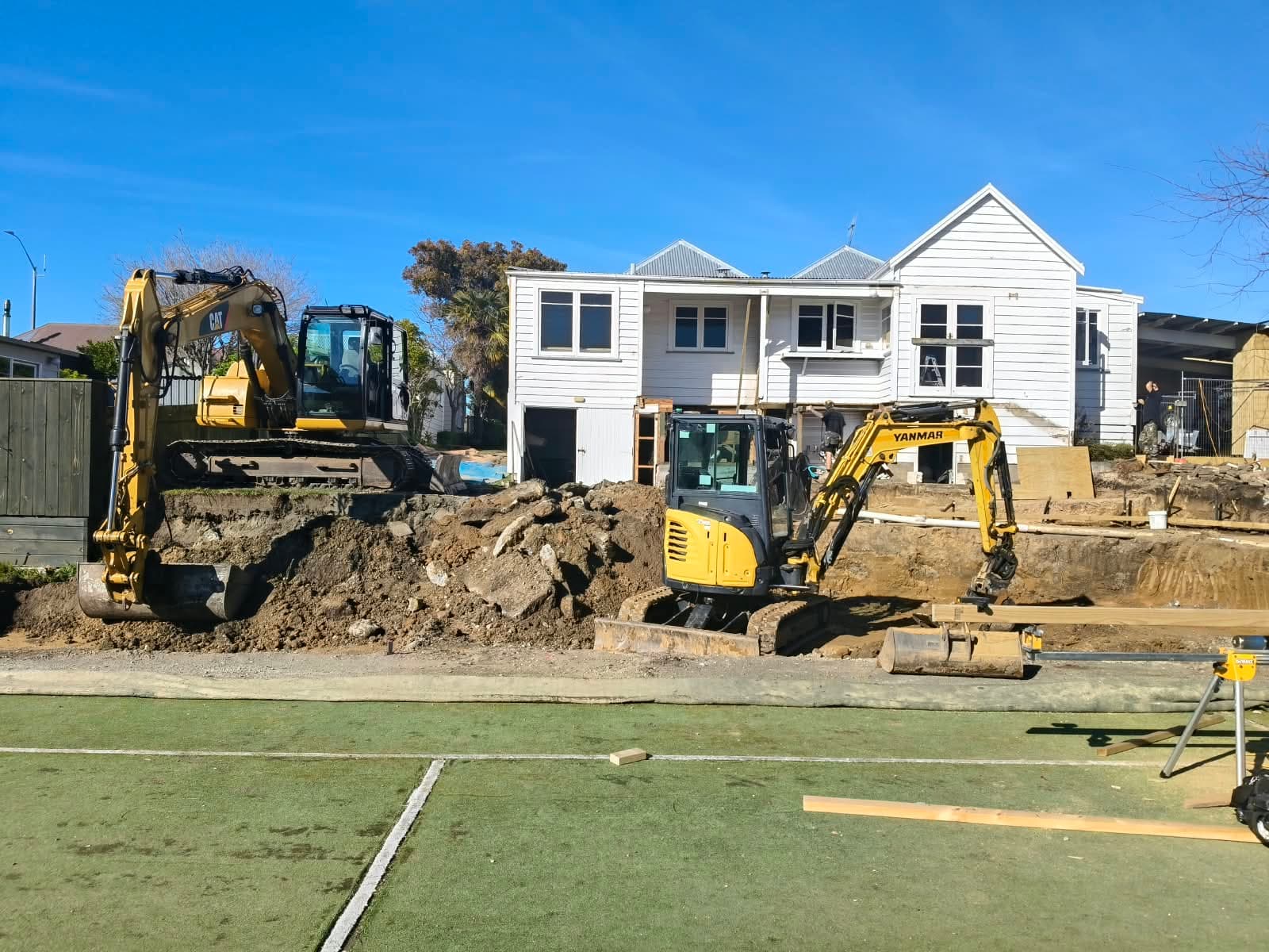 Excavator digging a residential house site